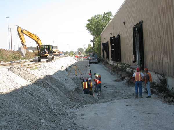 Inspection and compaction testing services during a rail yard, track and retaining wall installation in Bedford Park.